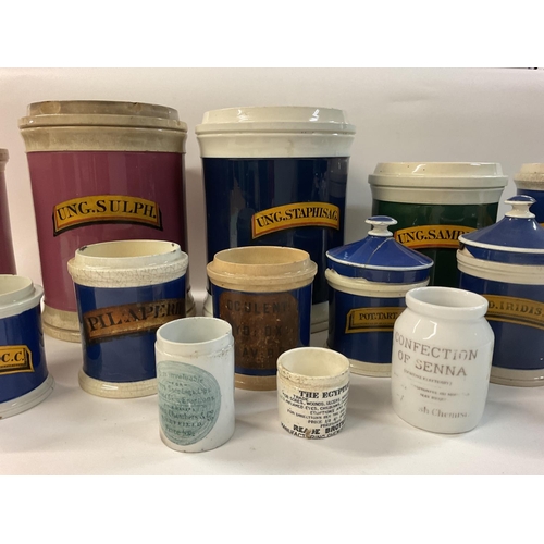 993 - A collection of creamware chemist pots, originally used for bulk quantity pharmacy purposes. Most ha... 