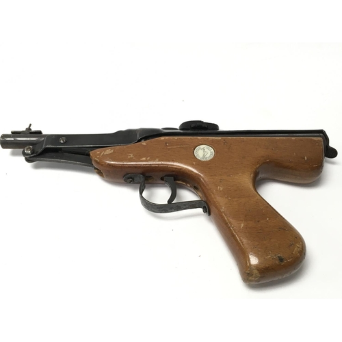 2066 - A vintage wooden handled Diana .177 Mark IV air pistol.