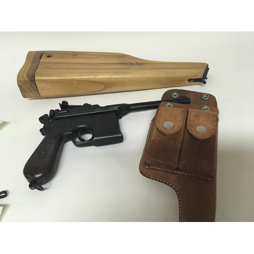 2078 - A non firing replica of a Mauser 96 Broom Handle with a leather holster and scratch built wooden sto... 