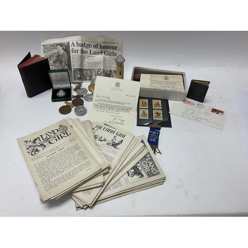 2080 - A collection of land army ephemera and medals