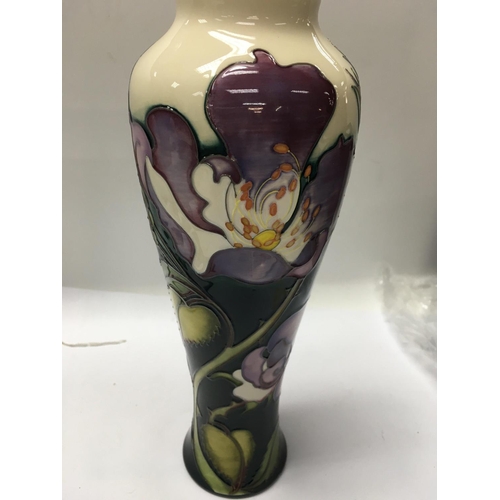 888 - A Moorcroft limited edition vase 35 /50 decorated in the rose pattern 27 cm no damage or restoration... 