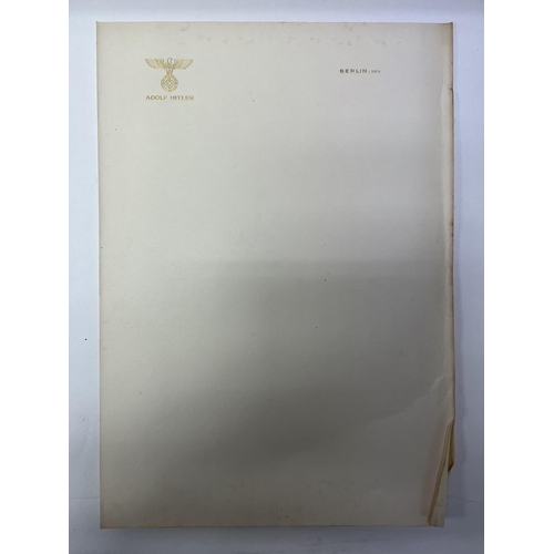 2067 - A single sheet of gilt letter headed paper from the desk of Adolf Hitler, Berlin. Folded, Den. (Corn... 