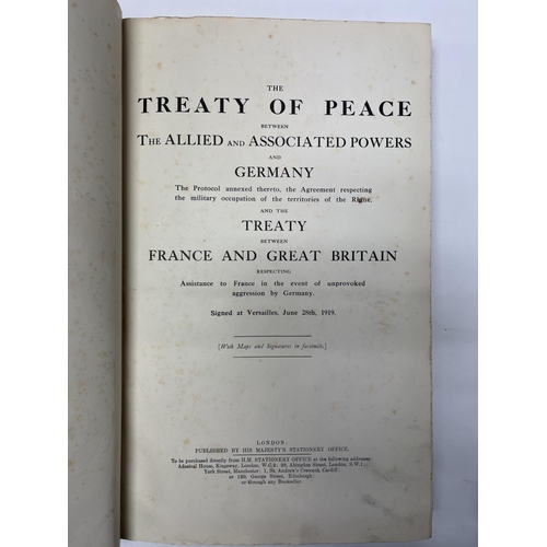 2072 - A blue leather bound edition titled the treaty of peace between the Allied and associated powers and... 