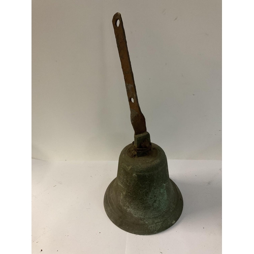 2110 - A collection of church hand bronze bells with lettering impressions on straps.