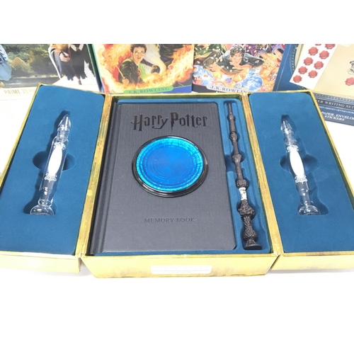 104 - A Collection of Harry Potter Items including 2 First Edition Books. Puzzles. And a Memory set.