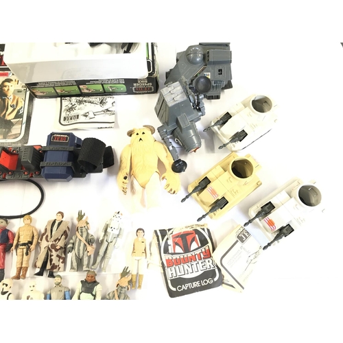 107 - A Collection of Vintage Star Wars Items and 2 X Re Carded Figures. Ideal for spare Parts Etc.