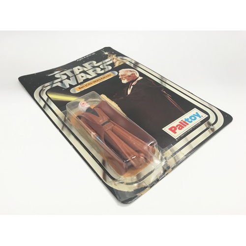 11 - A Vintage Star Wars Palitoy 1977 Carded Ben Obi-Wan Kenobi. One of the first 12 Figures released. Da... 