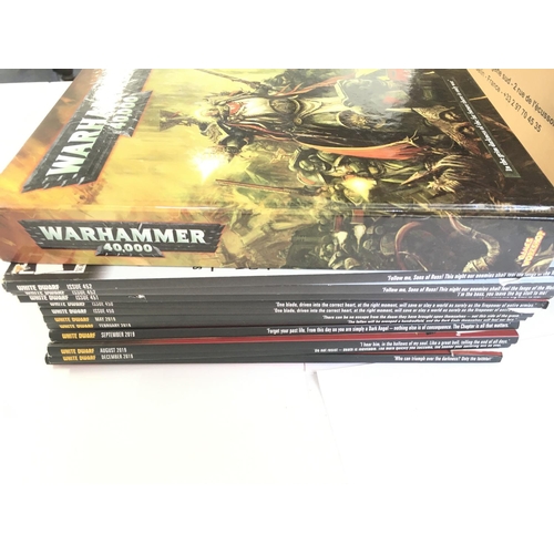 116 - A Box Containing War Hammer books and Figures.