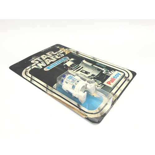 12 - A Vintage Star Wars Palitoy 1977 Carded R2-D2. One of the first 12 Figures released. Damage to. Are ... 