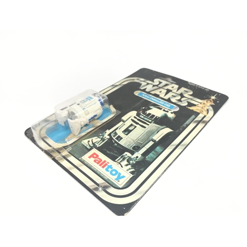 12 - A Vintage Star Wars Palitoy 1977 Carded R2-D2. One of the first 12 Figures released. Damage to. Are ... 