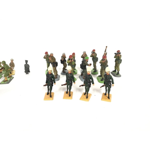 211 - A collection of various toy soldiers including Langley and Britain's.