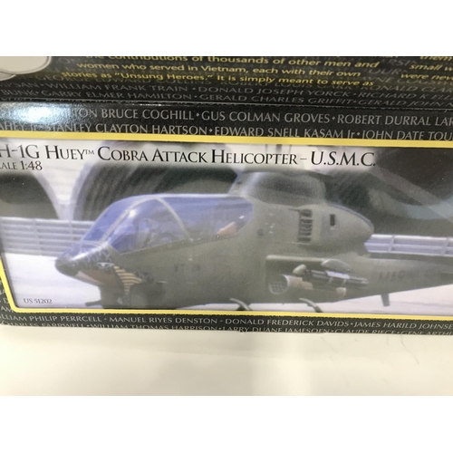 230 - A Boxed Corgi AH-1G Cobra Attack Helicopter and a Huey Hog Helicopter. (2)