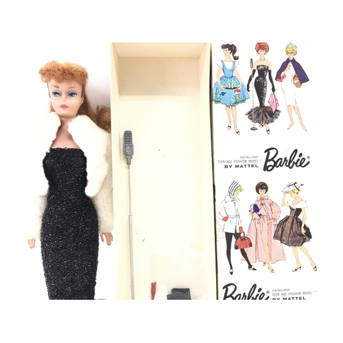 25 - A Boxed Vintage Barbie from 1962 under the spotlight. #850 Redhead. Ponytail.