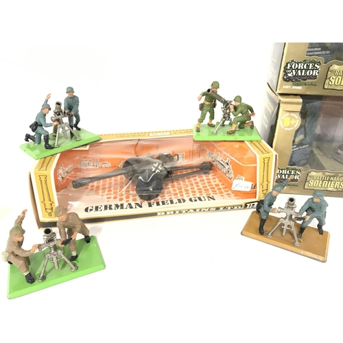 260 - A Collection of Britains Figures. A Boxed German Feild Gun and 2 Boxed Forces of Valour Figures Boxe... 