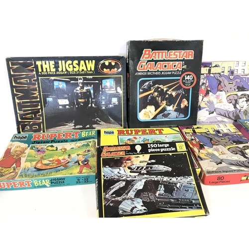 267 - Collection of various vintage jigsaw puzzles including bat man and Dune etc.