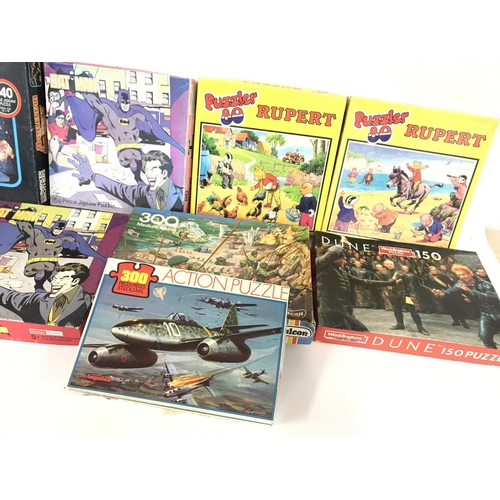 267 - Collection of various vintage jigsaw puzzles including bat man and Dune etc.