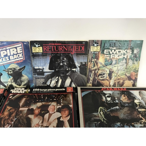 268 - Collection of vintage Star Wars puzzles and read along book and record.