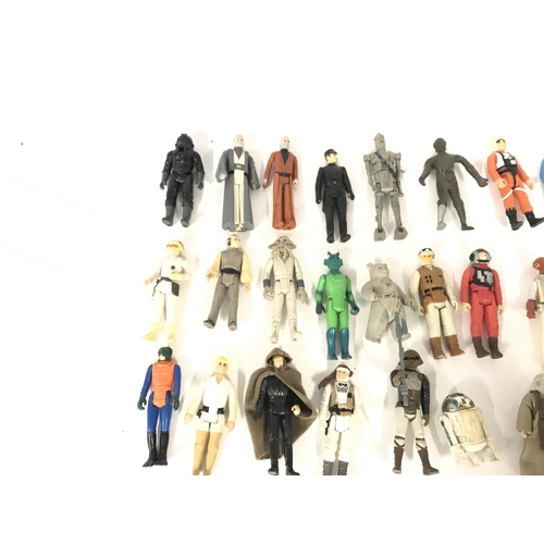 273 - A large collection of vintage Star Wars figures including r2d2 and storm trooper etc