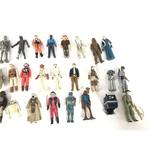 273 - A large collection of vintage Star Wars figures including r2d2 and storm trooper etc