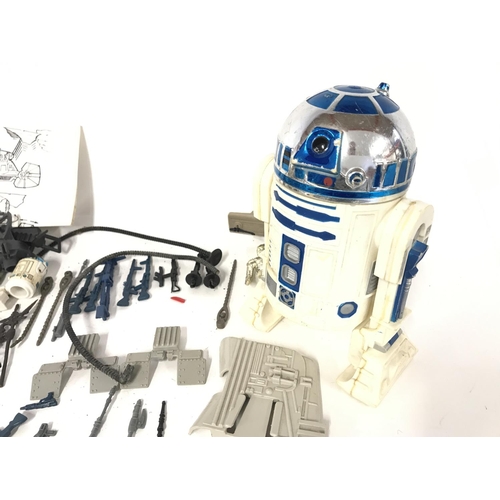 275 - A Collection of Vintage Star Wars Guns. Spares and a 12 inch R2-D2.