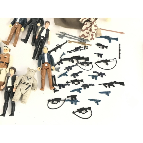 283 - A Collection of Vintage Star Wars Figures and Guns.