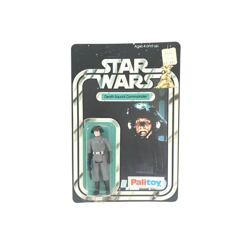 3 - A Vintage Star Wars Palitoy 1977 Carded Death Squad Commander. One of the first 12 Figures released.... 