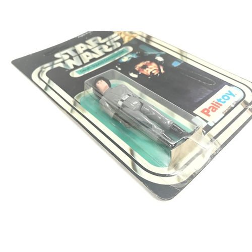 3 - A Vintage Star Wars Palitoy 1977 Carded Death Squad Commander. One of the first 12 Figures released.... 