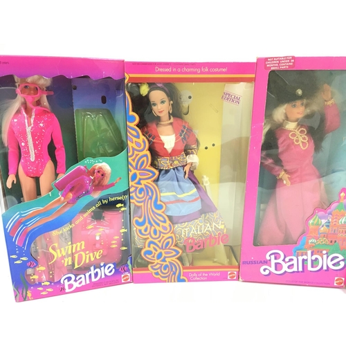 30 - 3 X Boxed Barbies and a Boxed Ken.(4).