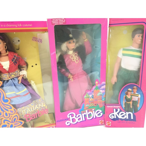 30 - 3 X Boxed Barbies and a Boxed Ken.(4).