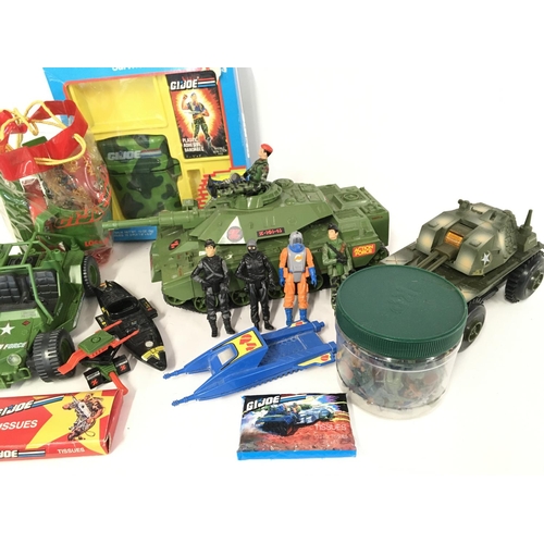 306 - A box containing a Collection of Action Force Figures. Vehicles and others etc.