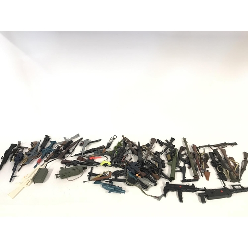 322 - Large collection of various guns including accessories including those for action man.