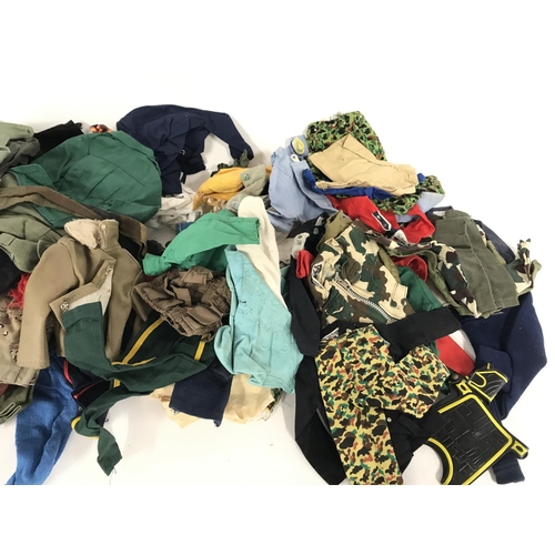 323 - Collection of various items of clothing and accessories including those for action man.