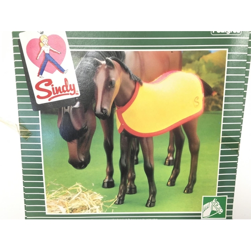 324 - A Boxed Sindy Horse Care Set. And a Sindy Foal by Pedigree.(2)