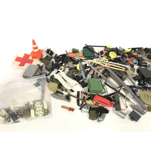 325 - Collection of various accessories for action figures including action man.