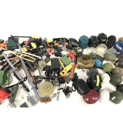 325 - Collection of various accessories for action figures including action man.