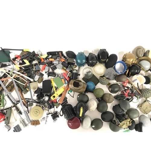 325 - Collection of various accessories for action figures including action man.