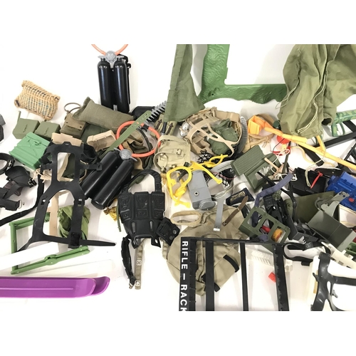 327 - Collection of various accessories for action figures including action man.