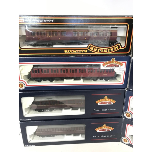 341 - A Collection of 00 Gauge Coaches Including Bachmann and Mainline. All boxed.