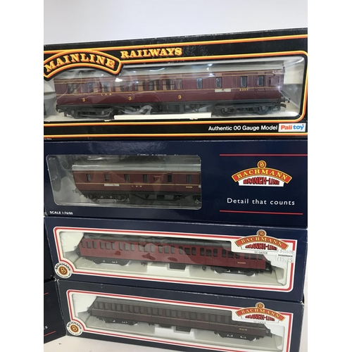 341 - A Collection of 00 Gauge Coaches Including Bachmann and Mainline. All boxed.