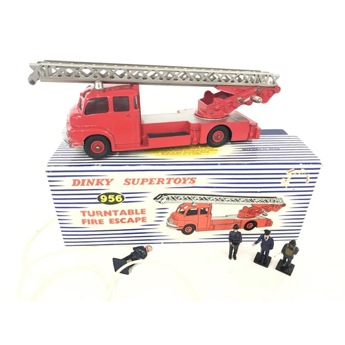 399 - A Boxed Dinky Supertoys Turntable Fire Escape #956 with Firemen and Hoses.