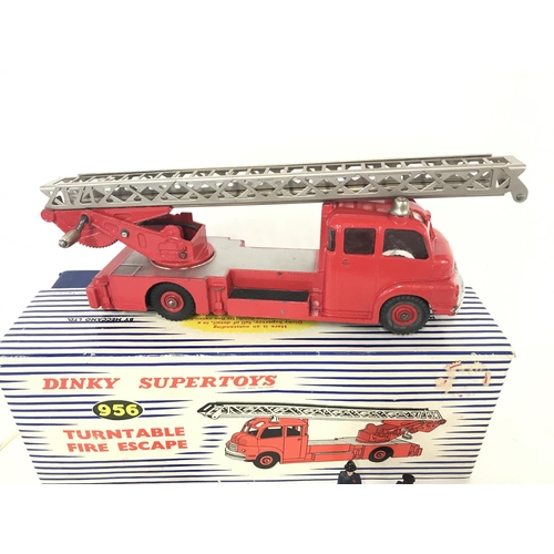 399 - A Boxed Dinky Supertoys Turntable Fire Escape #956 with Firemen and Hoses.