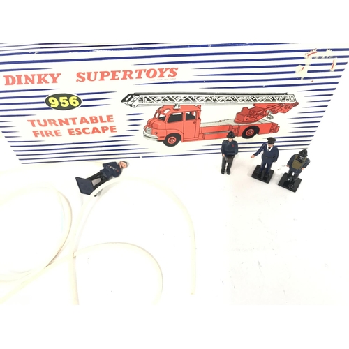 399 - A Boxed Dinky Supertoys Turntable Fire Escape #956 with Firemen and Hoses.