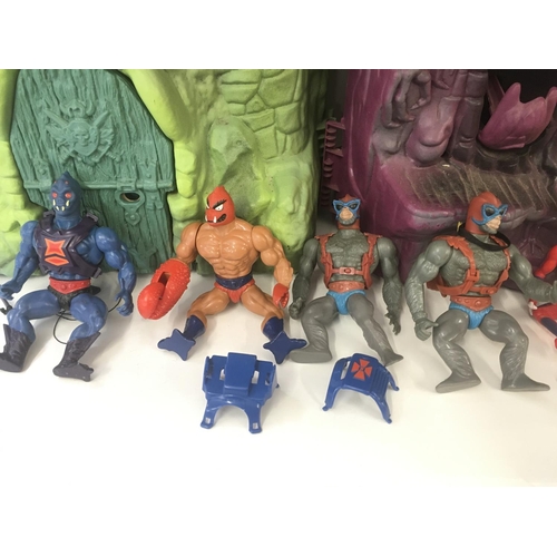 402 - A box of masters universes and he-man including figures and vehicles.