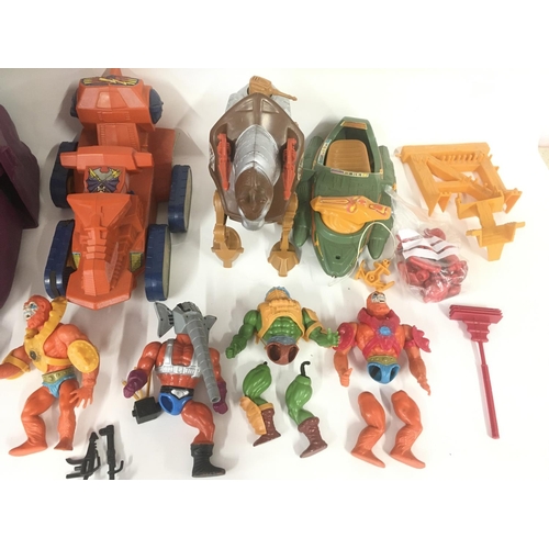 402 - A box of masters universes and he-man including figures and vehicles.