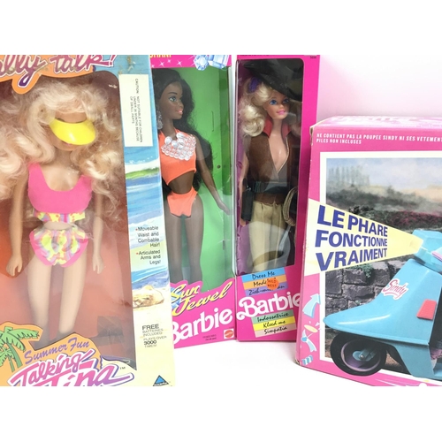 41 - A Box Containing a Collection of Boxed Sindys. Barbies and a Talking Tina.