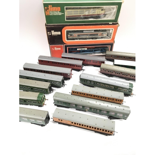 47 - A Collection of 00 Gauge Locos and Coaches (Some Boxed) including Lima and Tri-Ang.