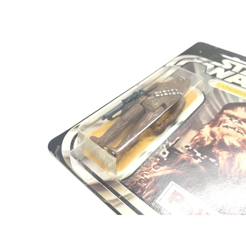 6 - A Vintage Star Wars Palitoy 1977 Carded Chewbacca. One of the first 12 Figures released.