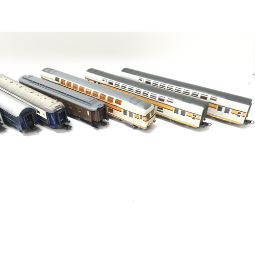 63 - A Collection of 00 Gauge Coaches and Locomotives. Including Lima.