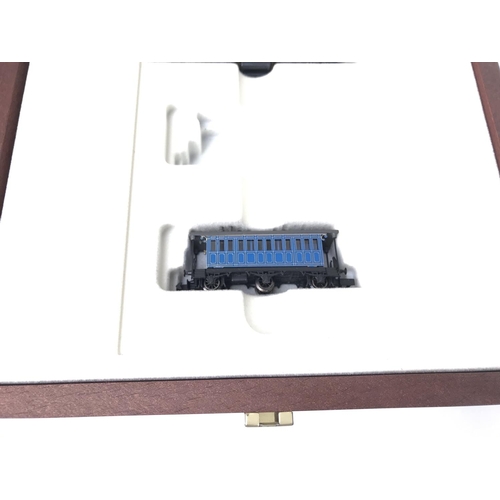 692 - A Boxed Arnold Railex Wooden Box Set #1465 ( one Carriage Missing). N Gauge.