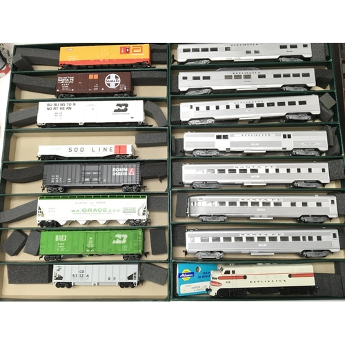 73 - A Collection of Athearn 00 Gauge Coaches. Freight wagons. A Dummy Car. And empty Boxes.